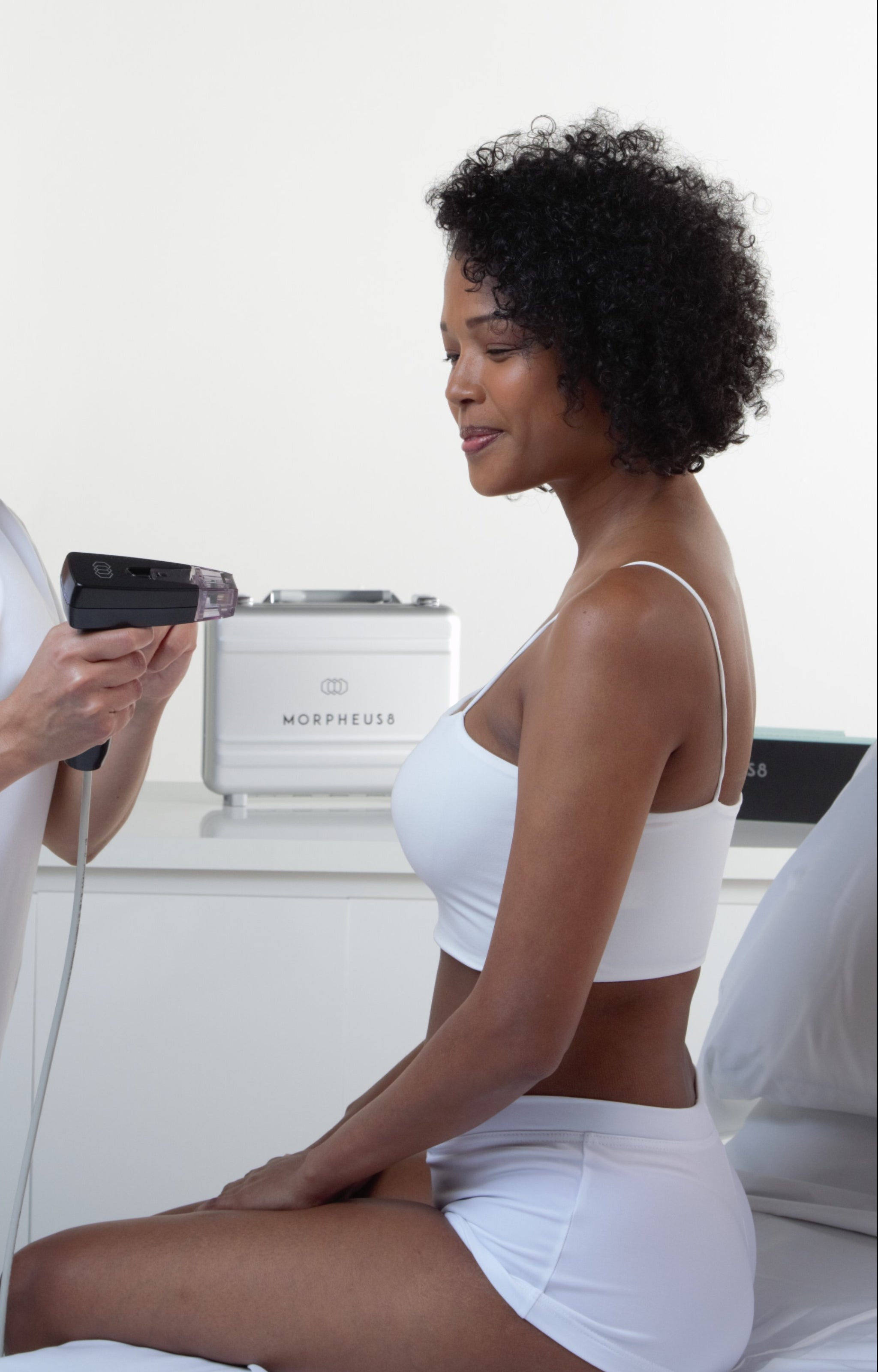 Morpheus8 Consultation: Tailoring Skincare to Your Needs Model having a consultation for Morpheus8 skincare treatment.