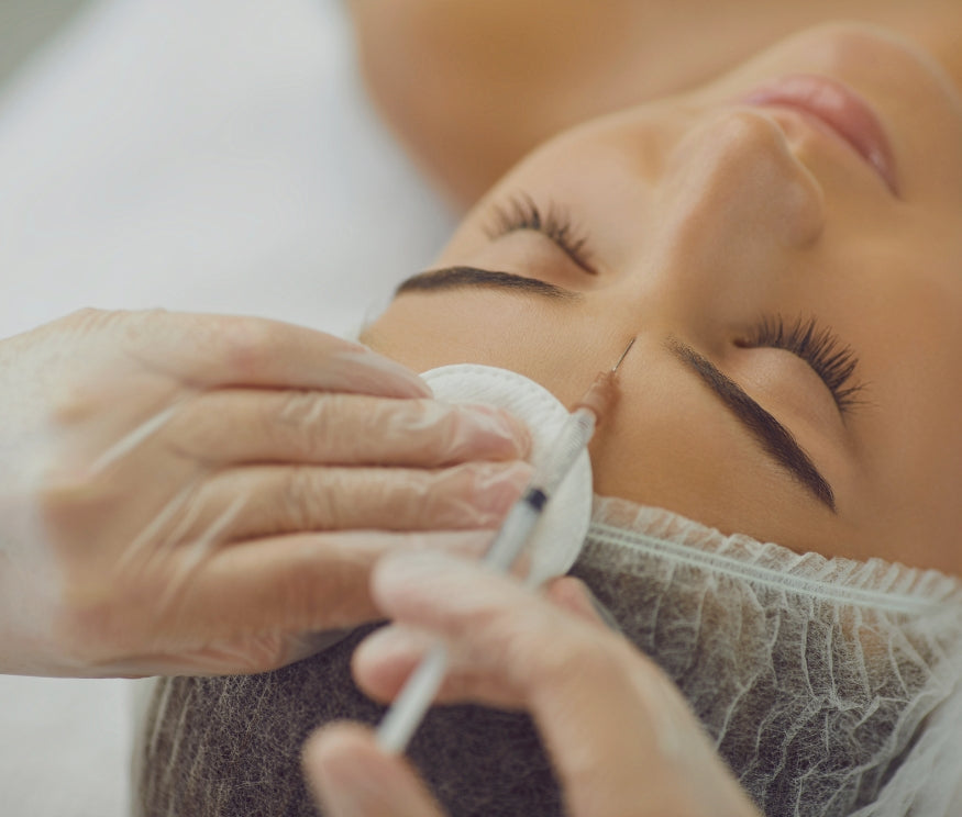 Model undergoing Morpheus8 treatment for facial rejuvenation at Studios Vis a Vis Toronto