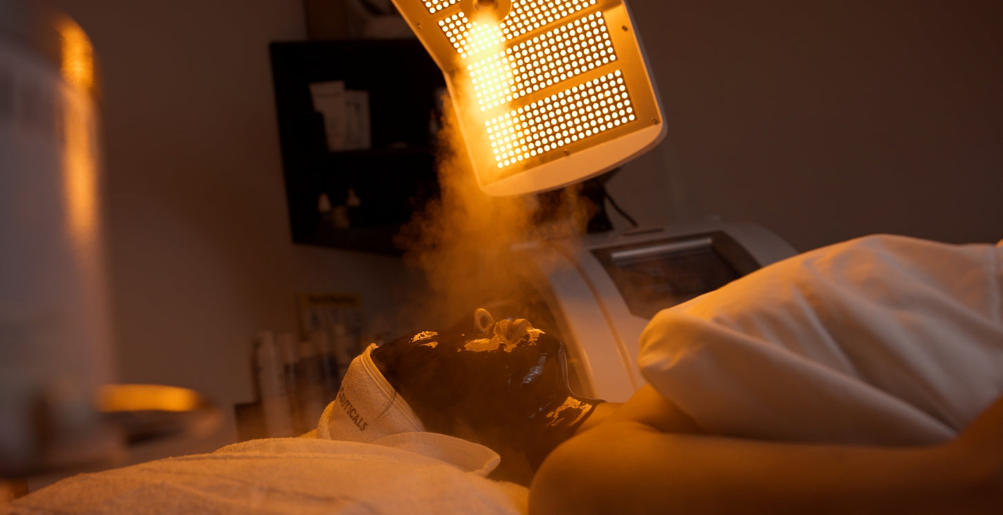 Client receiving facial mask from 111skin during a fall facial treatment.