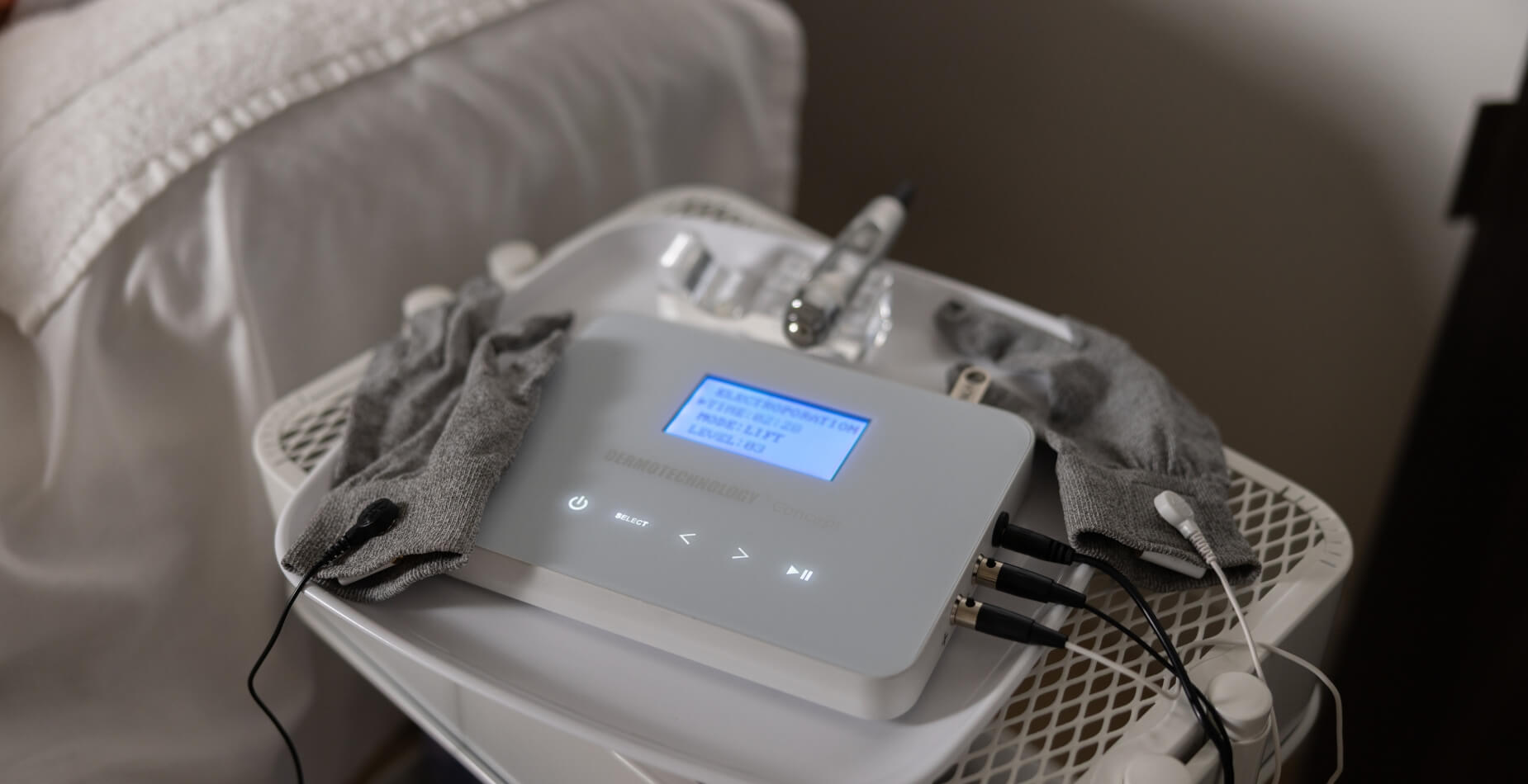 Dermotechnology facial device and sculpting gloves prepared for LIFTED treatment at Vis A Vis