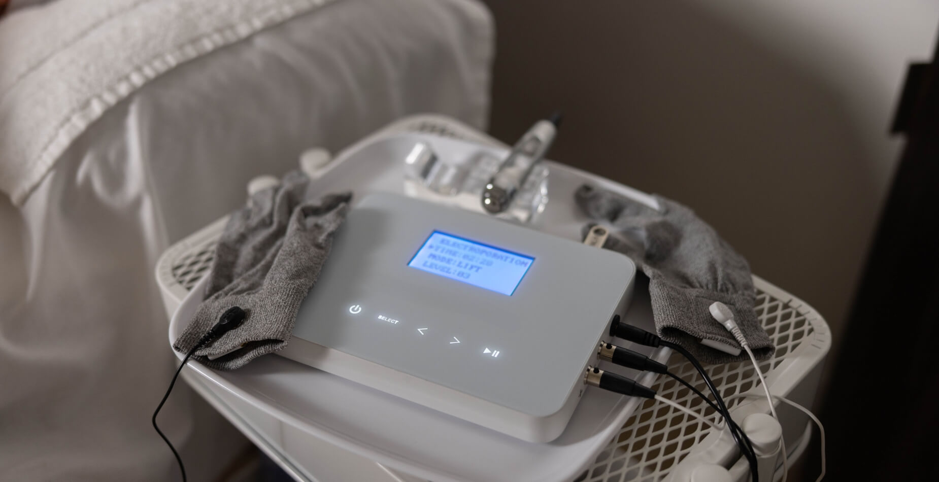 Dermotechnology facial device and sculpting gloves prepared for LIFTED treatment at Vis A Vis